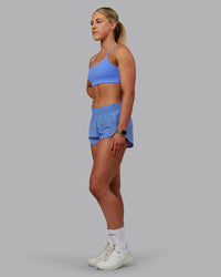 Woman wearing Energy 1.8" Training Shorts - Ultramarine