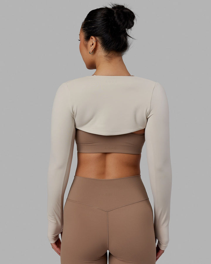 Woman wearing Energy LS Bolero - Shale Beige