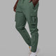 Man wearing Energy Stretch Performance Cargo Joggers - Dark Forest