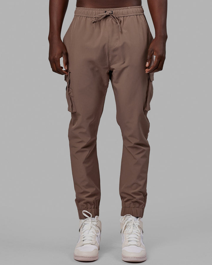 Woman wearing Energy Stretch Performance Cargo Joggers - Deep Taupe