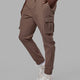 Woman wearing Energy Stretch Performance Cargo Joggers - Deep Taupe