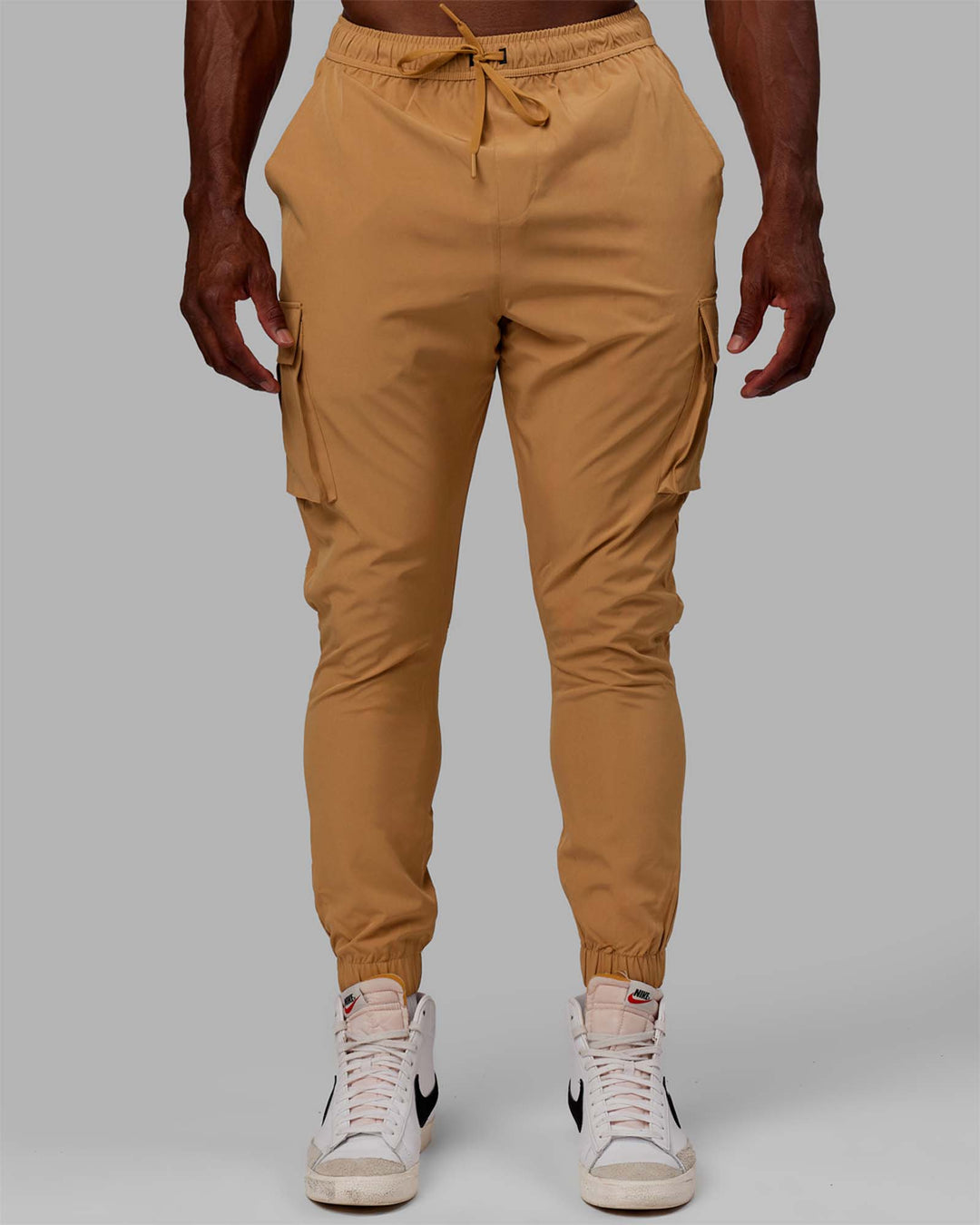 Man wearing Energy Stretch Performance Cargo Joggers - Latte