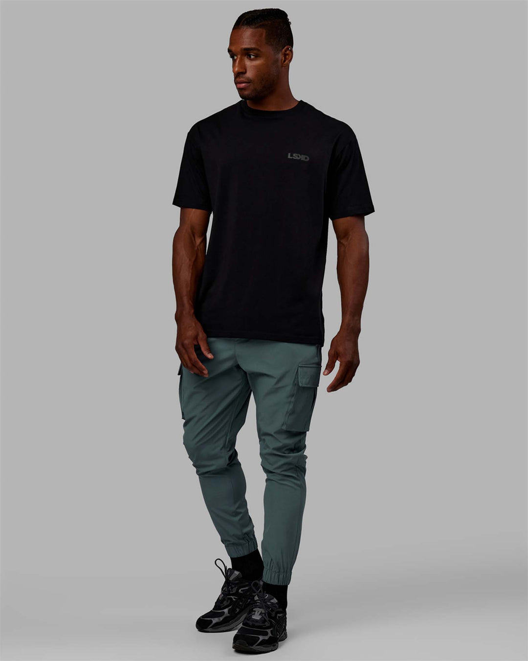 Man wearing Energy Stretch Performance Cargo Joggers - Storm