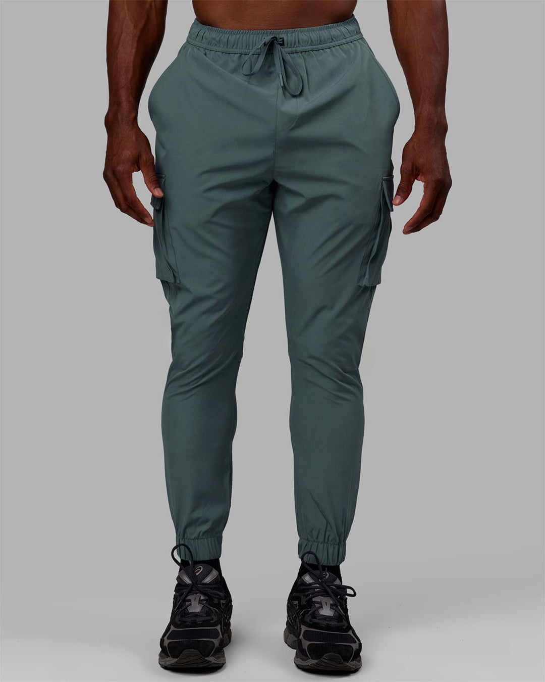 Man wearing Energy Stretch Performance Cargo Joggers - Storm