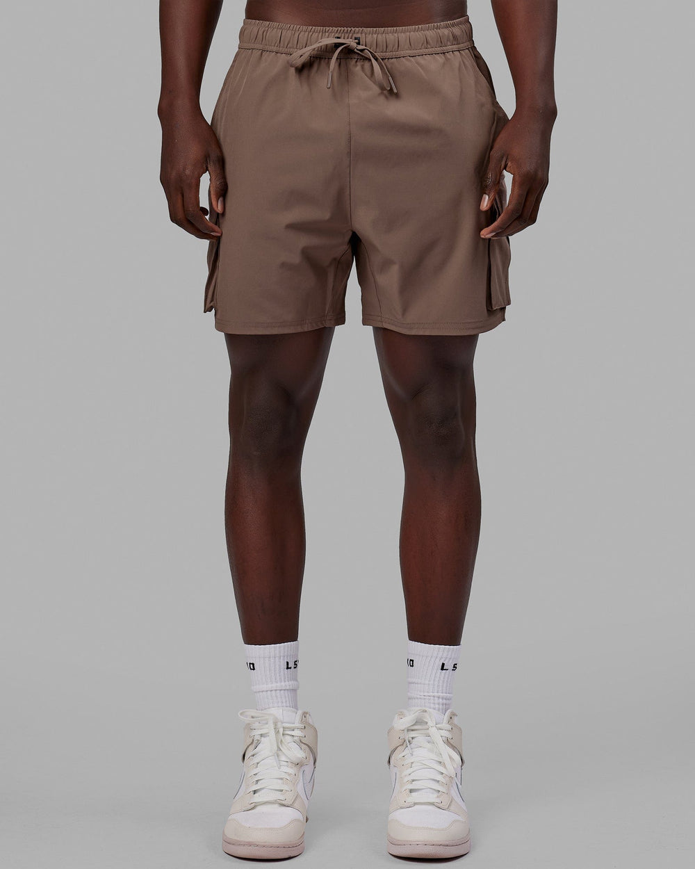 Man wearing Energy Stretch Performance Cargo Short - Deep Taupe