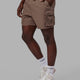 Man wearing Energy Stretch Performance Cargo Short - Deep Taupe