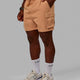 Man wearing Energy Stretch Performance Cargo Shorts - Latte