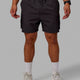 Man wearing Energy Stretch Performance Cargo Shorts - Pirate Black