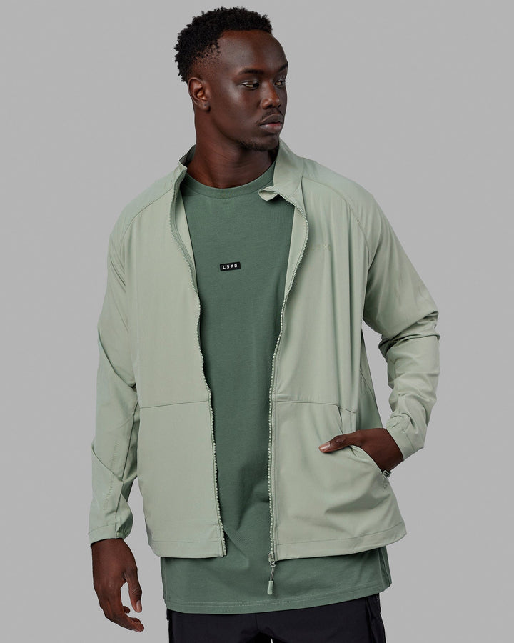 Man wearing Energy Stretch Performance Jacket - Iceberg Green