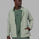 Man wearing Energy Stretch Performance Jacket - Iceberg Green