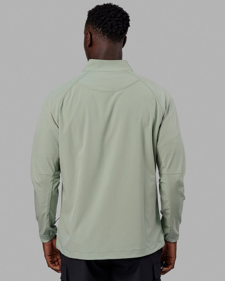 Man wearing Energy Stretch Performance Jacket - Iceberg Green