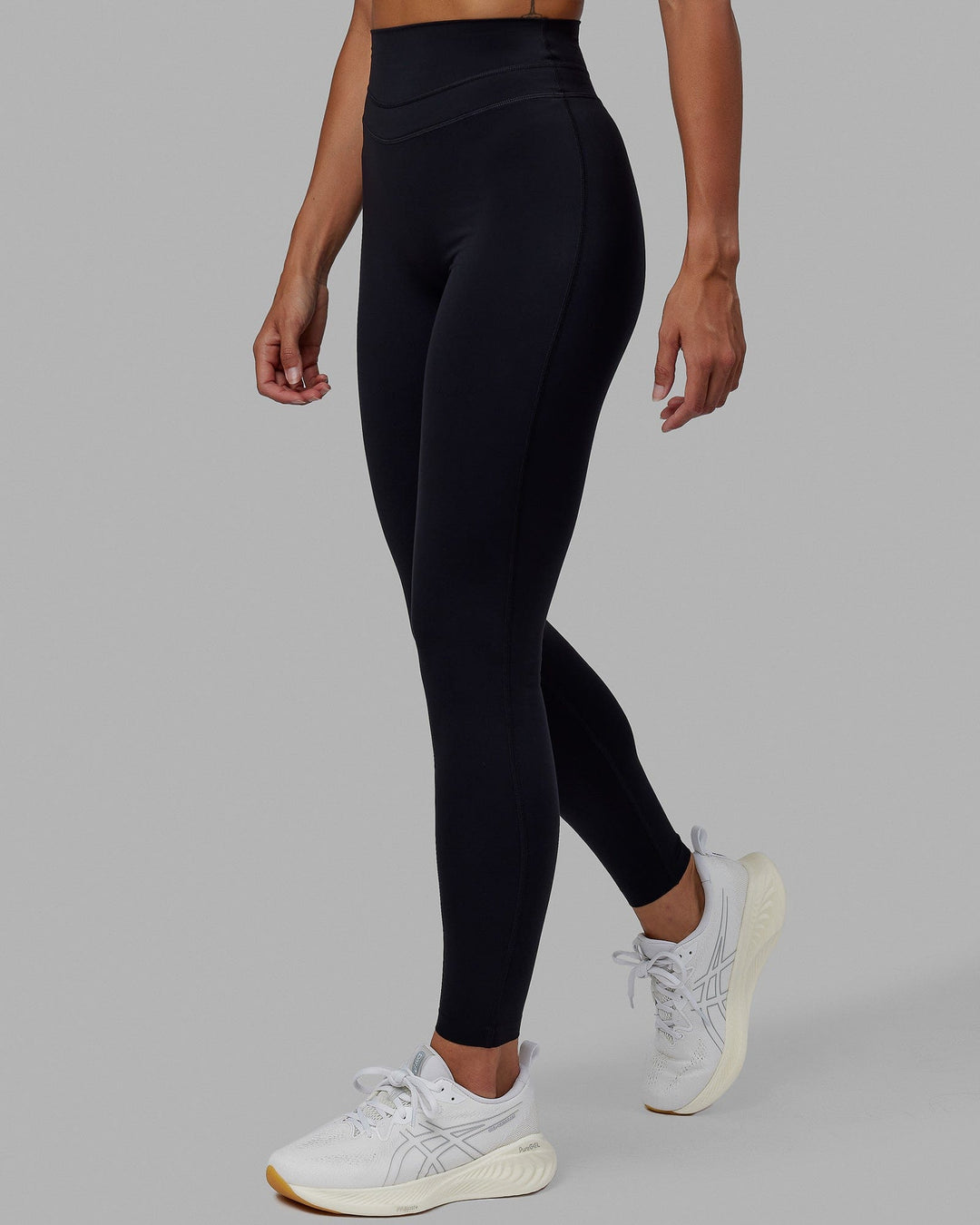 Woman wearing Enhance Full Length Tights - Black
