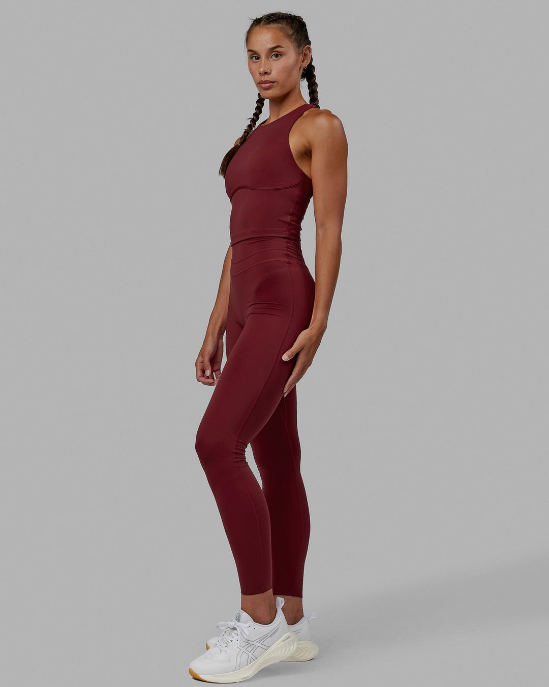 Woman wearing Enhance Full Length Tights - Cranberry