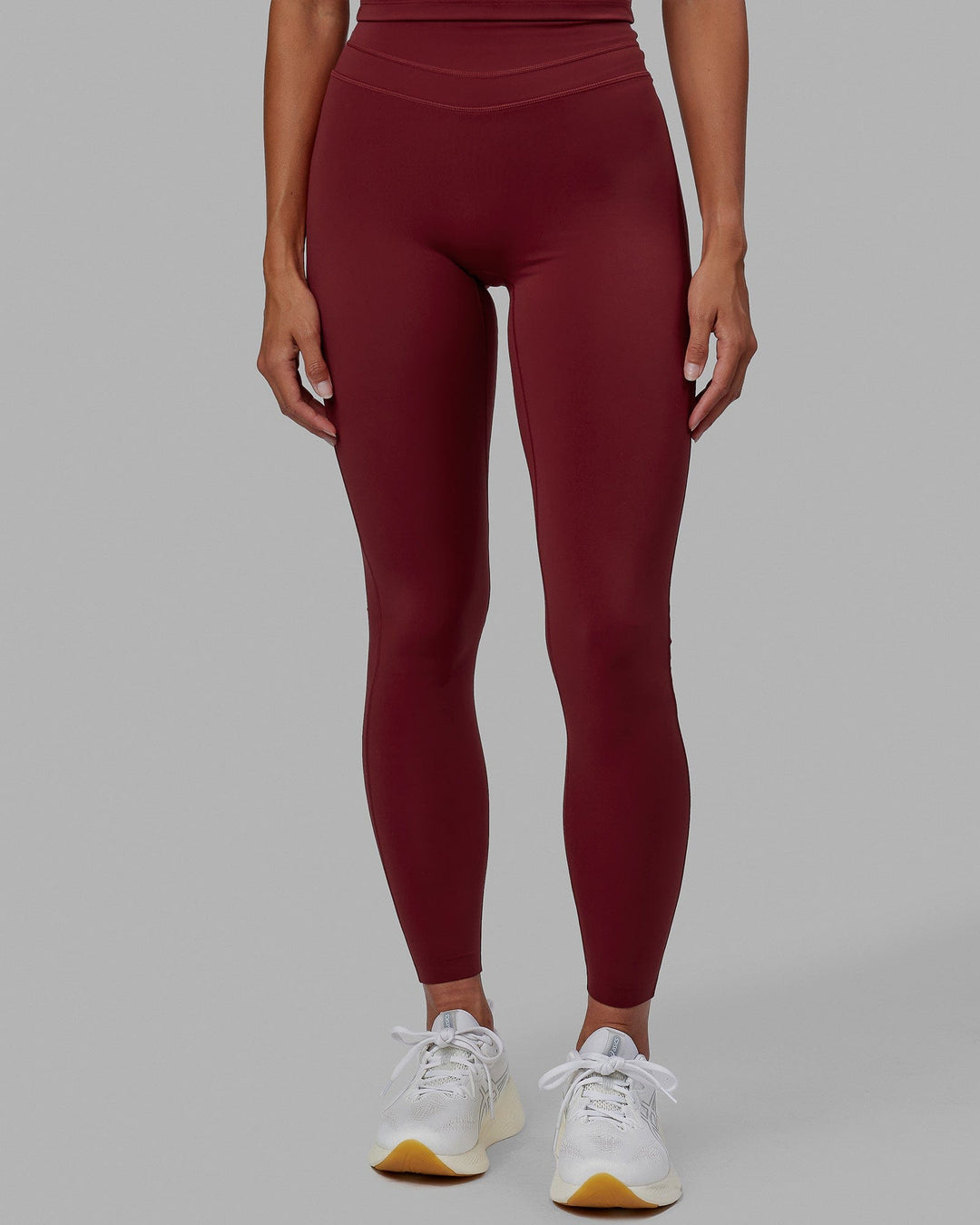 Woman wearing Enhance Ultra High-Rise Tall Legging - Cranberry