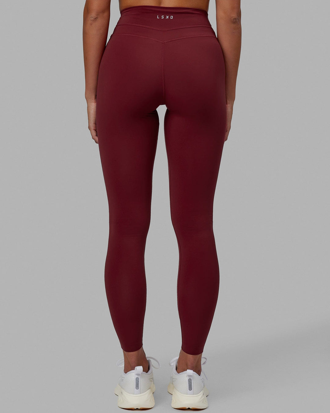 Woman wearing Enhance Full Length Tights - Cranberry