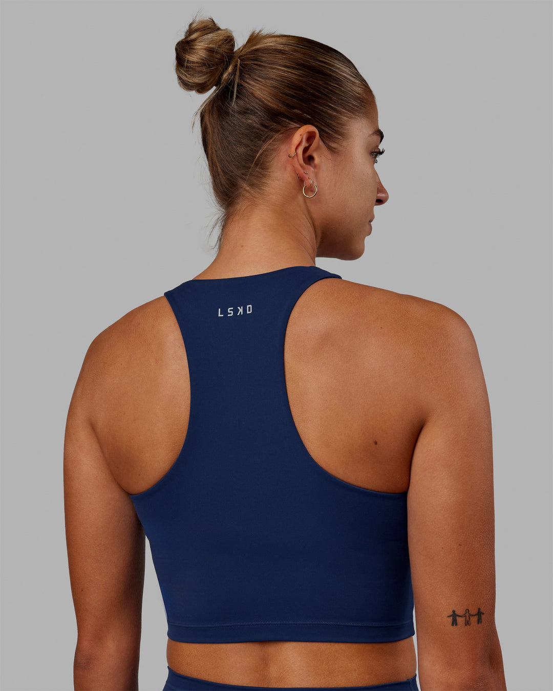 Woman wearing Enhance Shelf Bra Tank - Midnight Blue