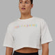 Woman wearing Enjoy the Journey Heavyweight Cropped Tee - Off White