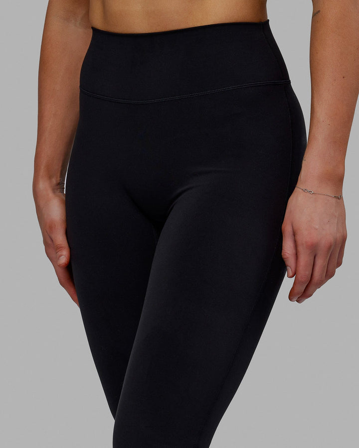 Woman wearing Everyday Flare X-Long Tight - Black