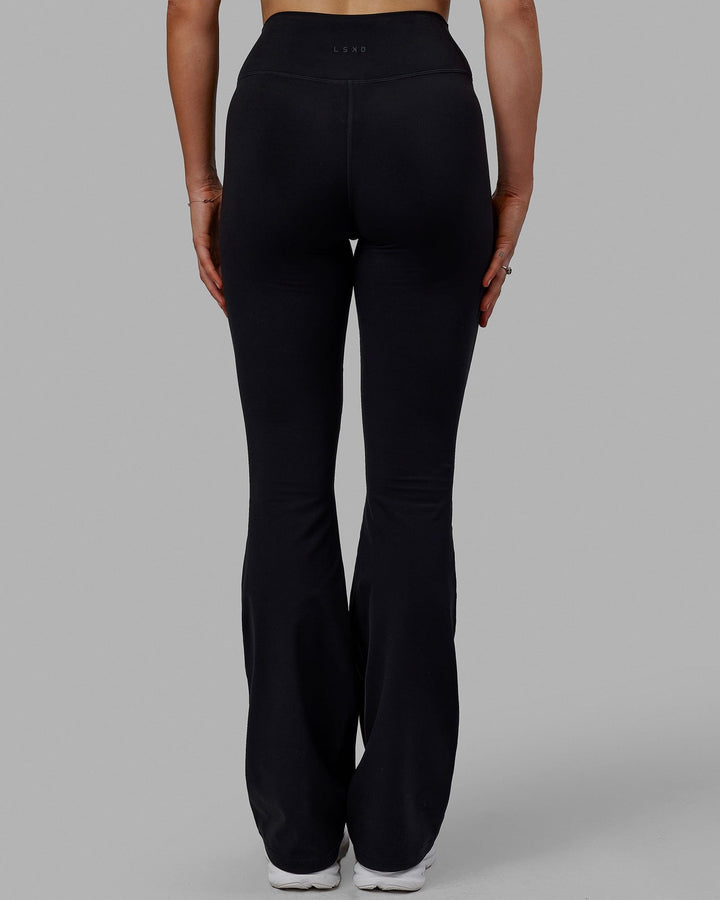 Woman wearing Everyday Flare X-Long Tight - Black