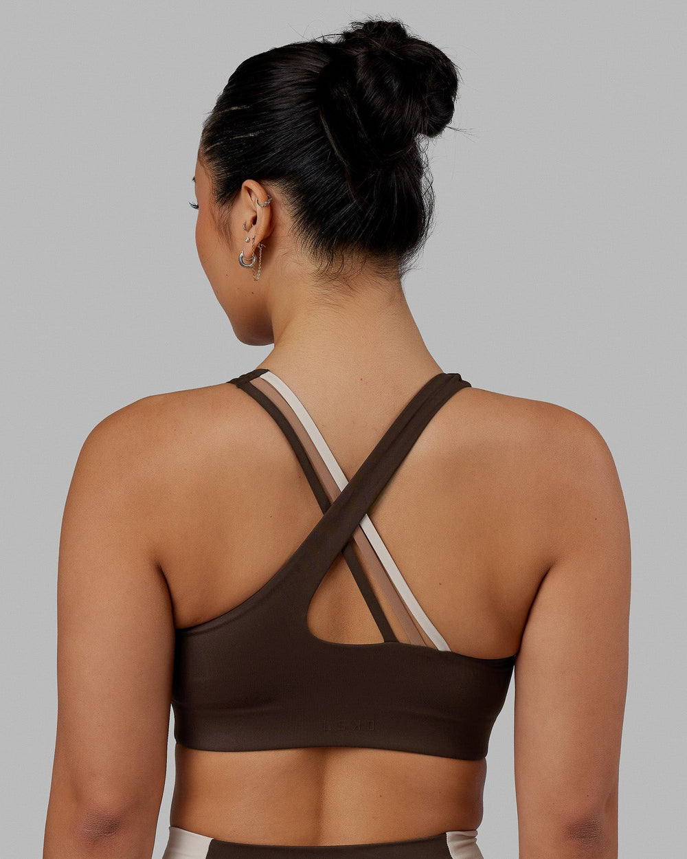 Woman wearing Evolve Bra - Dark Chocolate
