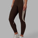 Woman wearing Evolve Full Length Tights - Dark Chocolate