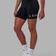 Woman wearing Evolved Mid Short Tight - Black-White