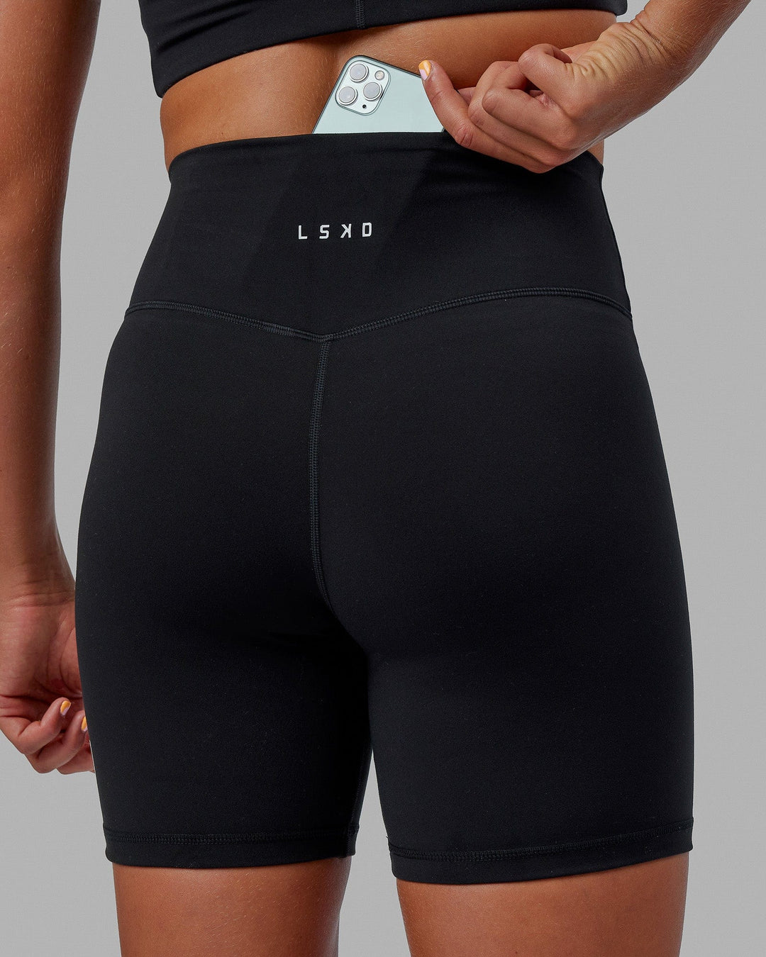 Woman wearing Evolved Ultra High-Rise 6&quot; Short - Black-White