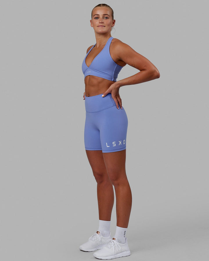 Woman wearing Evolved Mid Short Tight - Cornflower