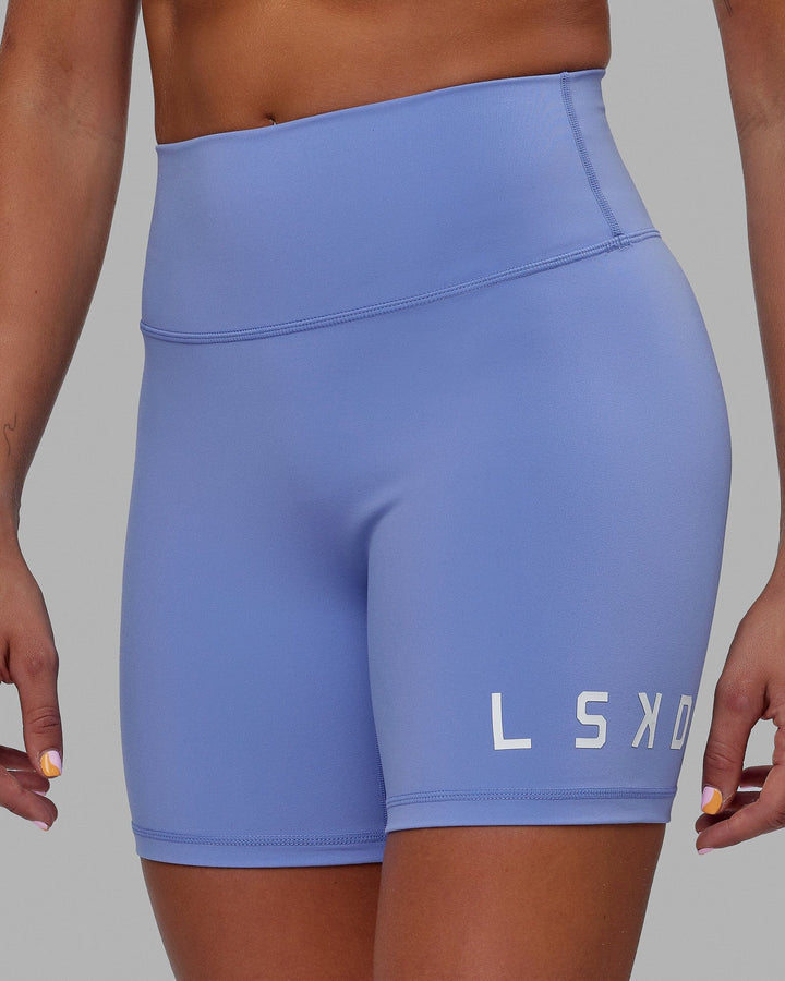 Woman wearing Evolved Mid Short Tight - Cornflower