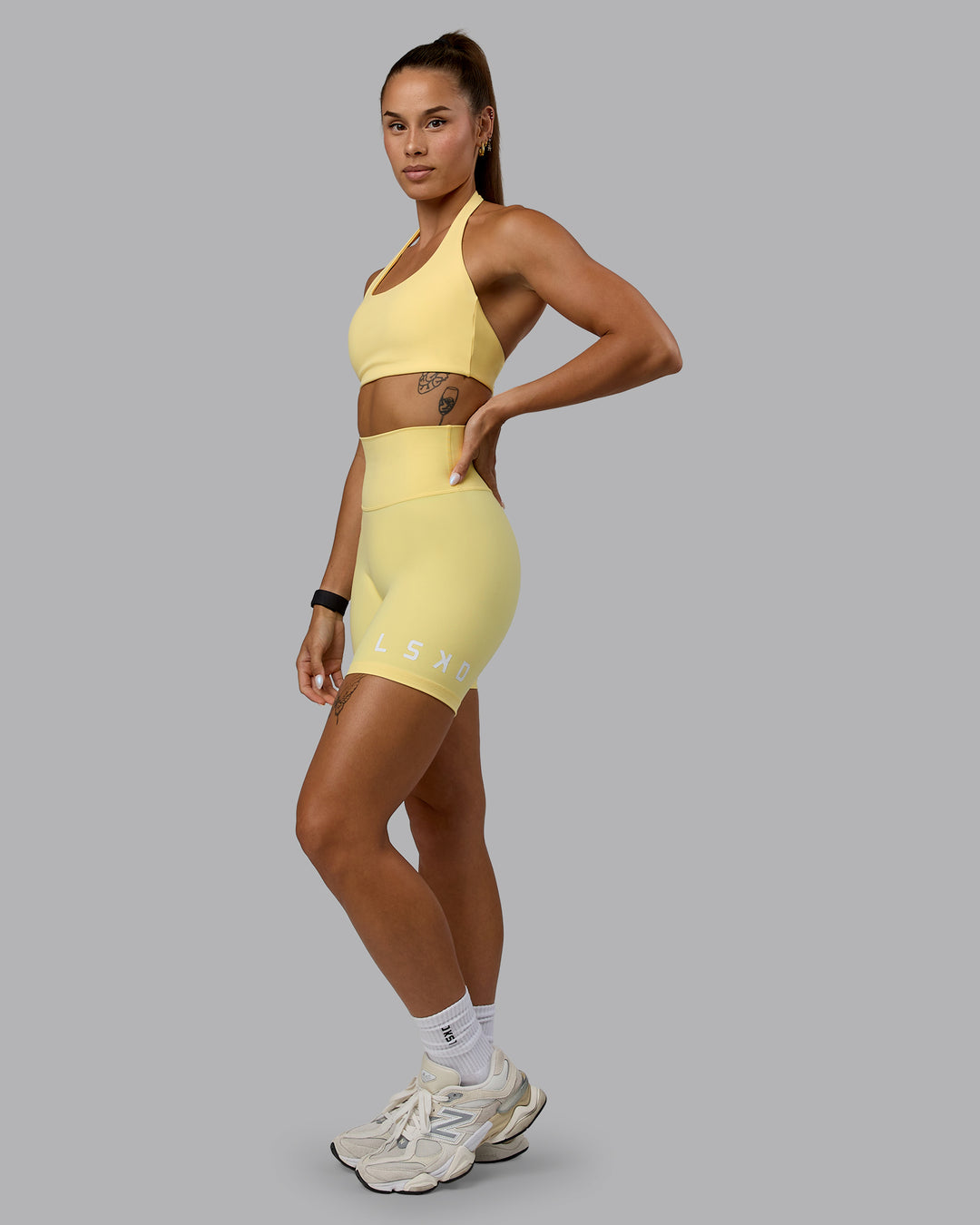 Woman wearing Evolved Ultra High-Rise 6&quot; Short - Lemon-White