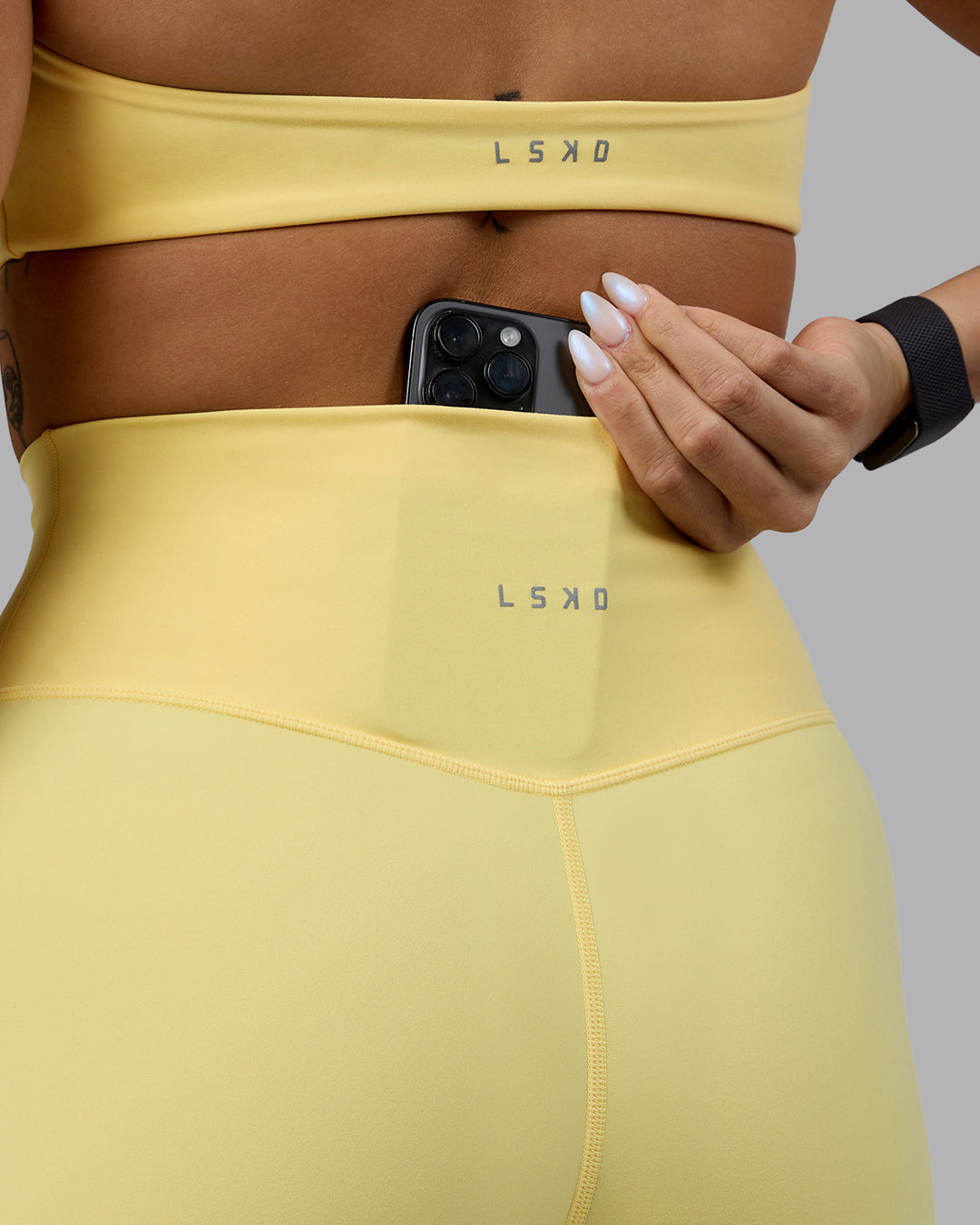 Woman wearing Evolved Ultra High-Rise 6&quot; Short - Lemon-White