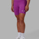 Woman wearing Evolved Mid Short Tights - Orchid-White