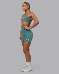 Woman wearing Evolved Ultra High-Rise 6" Short - Sagebrush-White