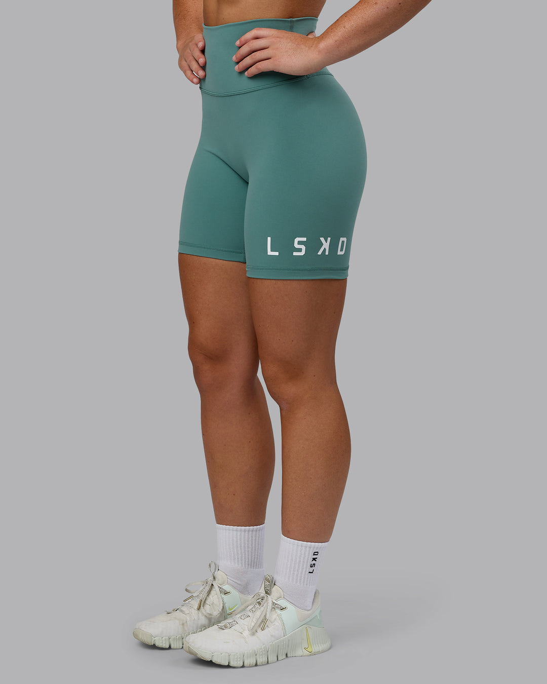 Woman wearing Evolved Ultra High-Rise 6&quot; Short - Sagebrush-White