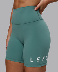 Woman wearing Evolved Ultra High-Rise 6" Short - Sagebrush-White