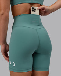 Woman wearing Evolved Ultra High-Rise 6" Short - Sagebrush-White