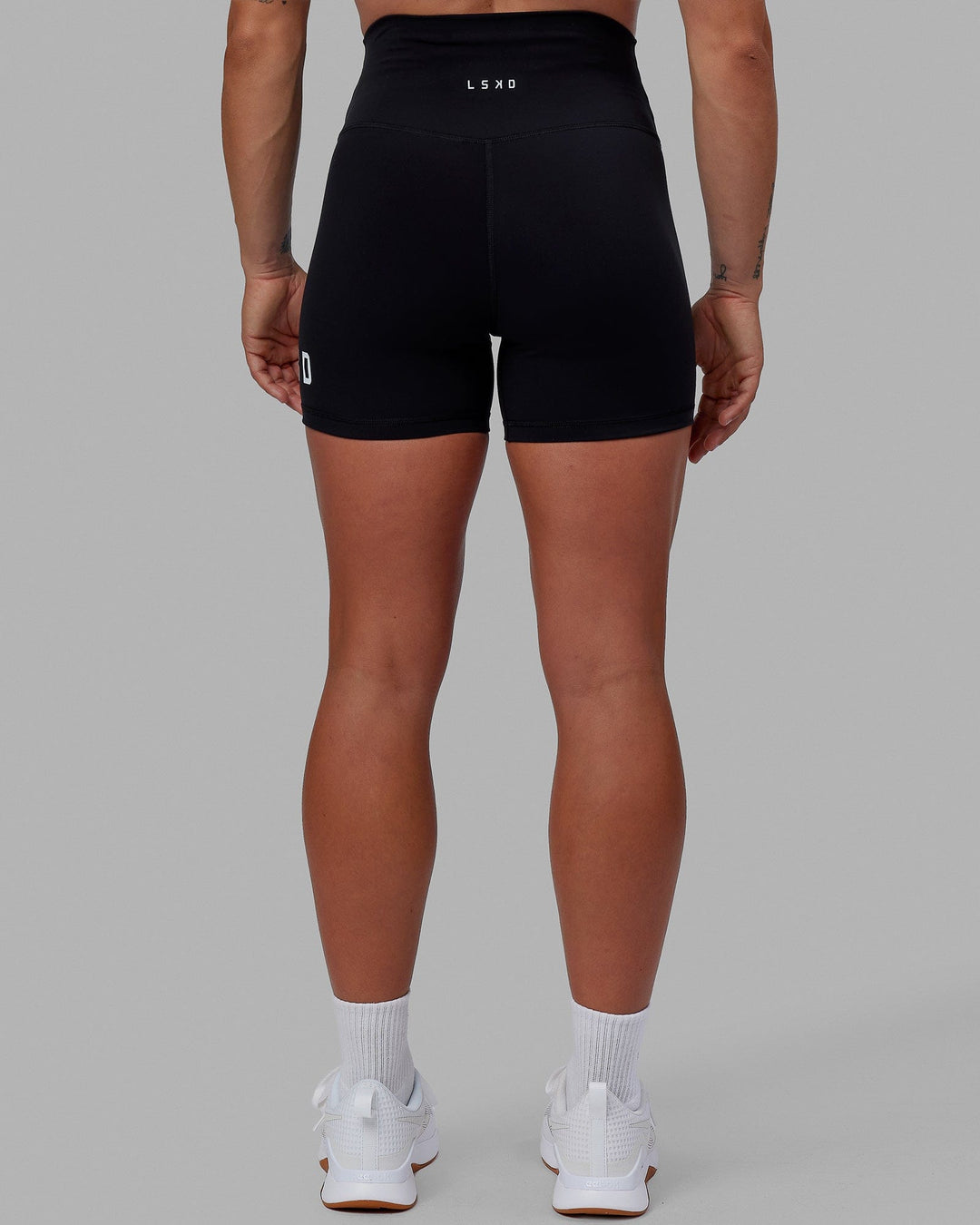 Woman wearing Evolved X-Short Tights - Black-White