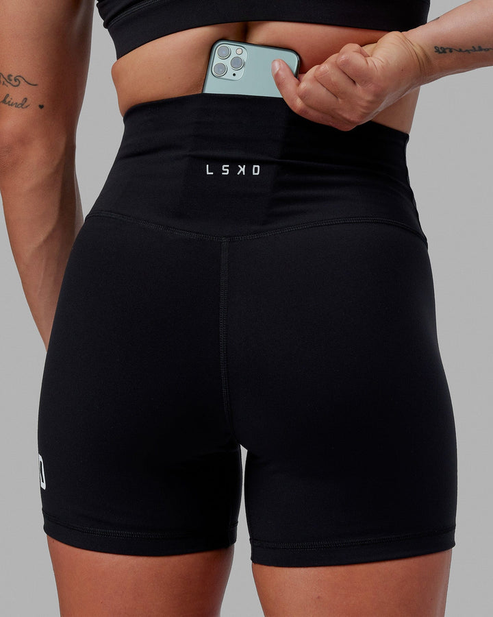 Woman wearing Evolved X-Short Tights - Black-White