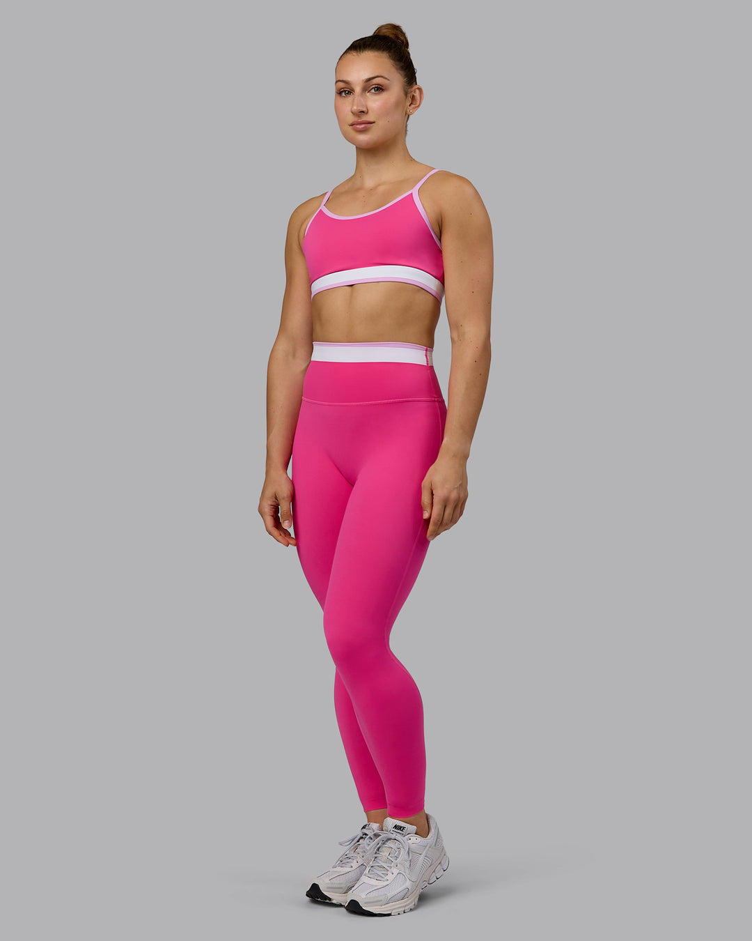 Woman wearing Excel Ultra High-Rise Full Length Legging - Ultra Pink