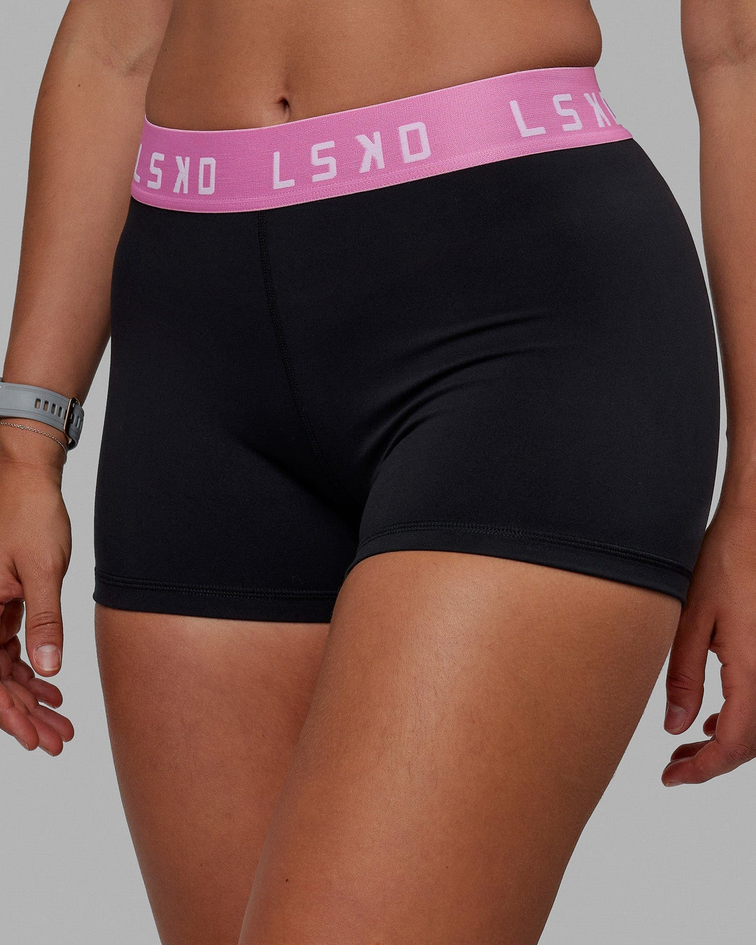 Woman wearing Extend X-Short Tights - Black-Spark Pink