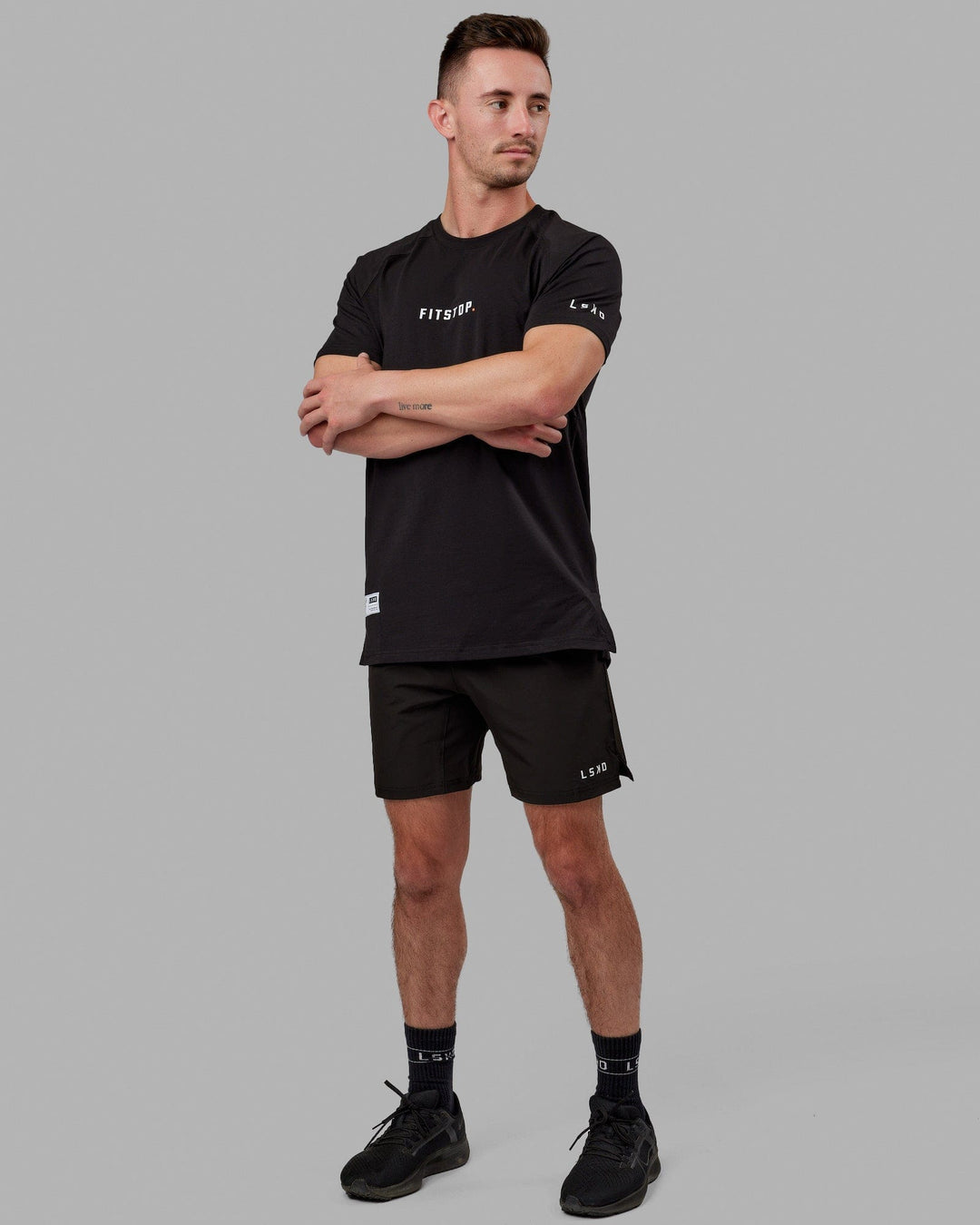 Man wearing Fitstop Optimal Tee - Black
