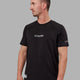 Man wearing Fitstop Optimal Tee - Black