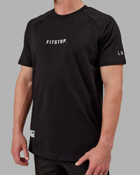 Man wearing Fitstop Optimal Tee - Black