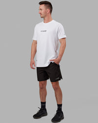 Man wearing Fitstop Optimal Tee - White