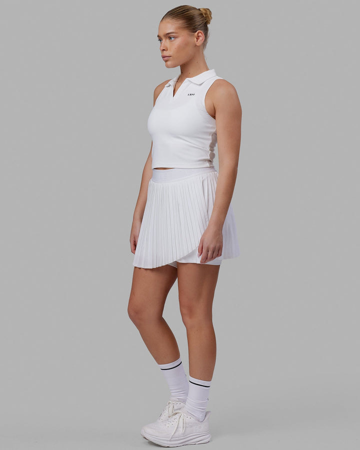 Woman wearing Fairway Collared Tank - White