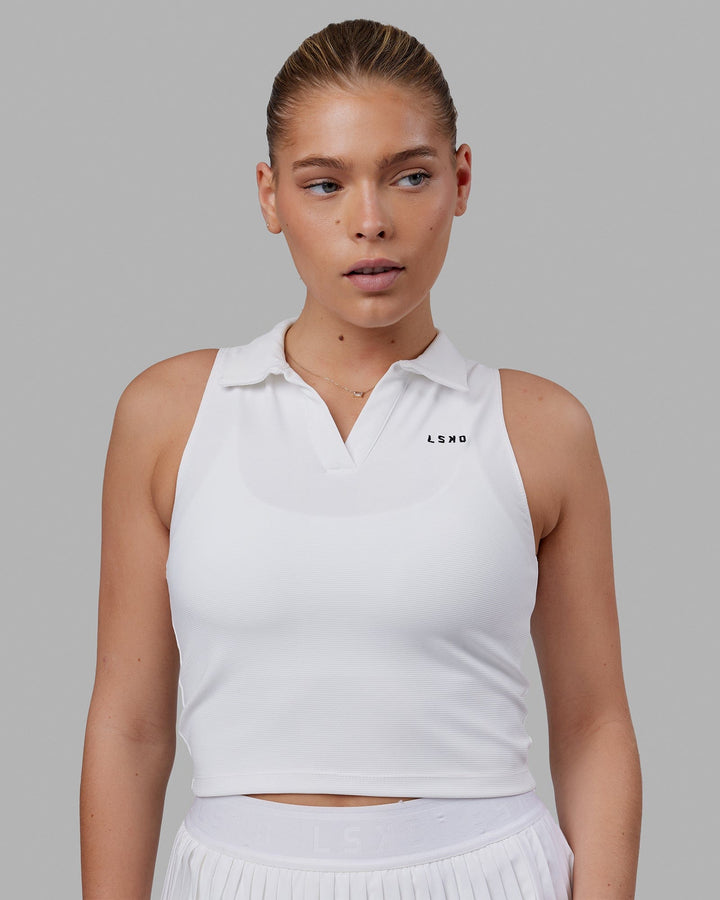 Woman wearing Fairway Collared Tank - White