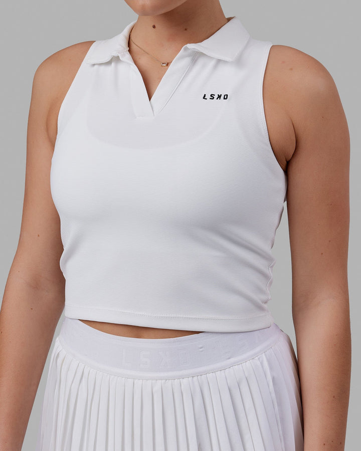 Woman wearing Fairway Collared Tank - White