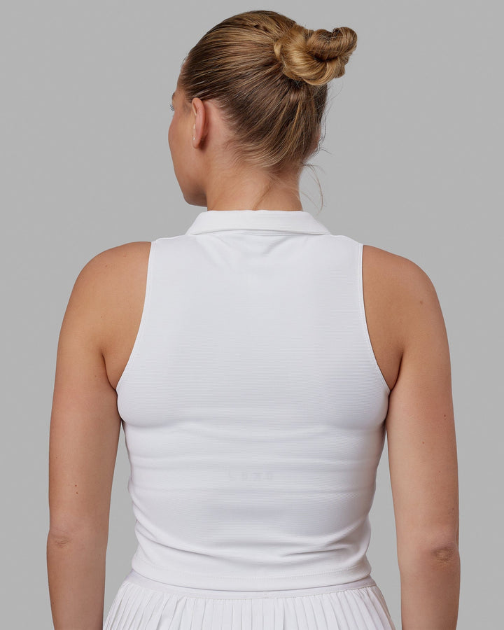 Woman wearing Fairway Collared Tank - White
