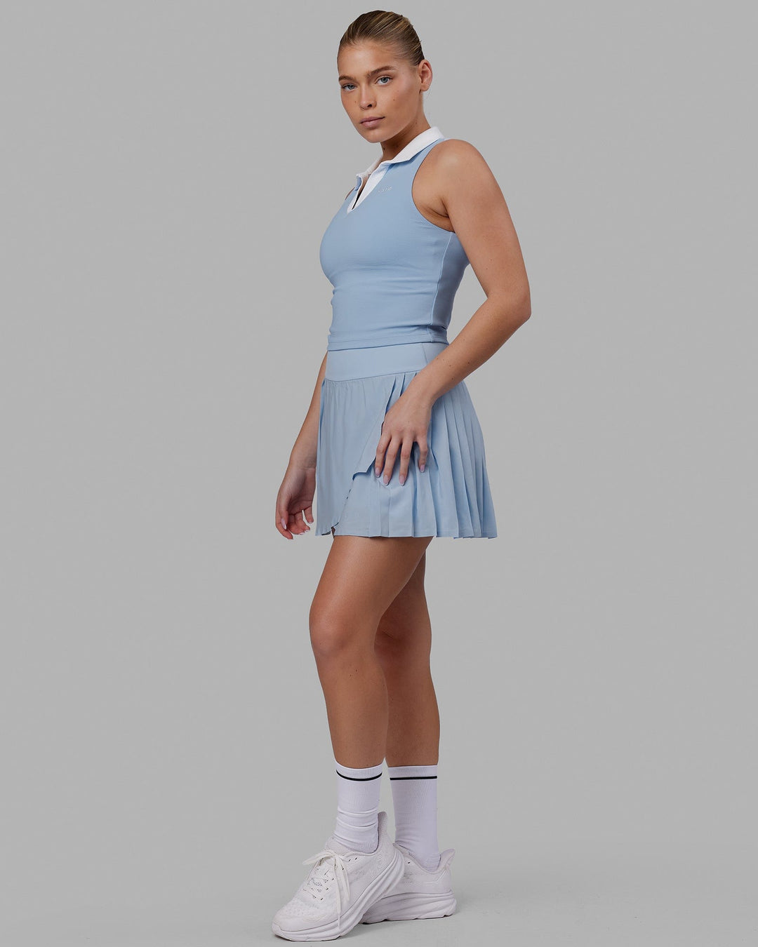 Woman wearing Fairway Collared Tank - Windsurfer-White