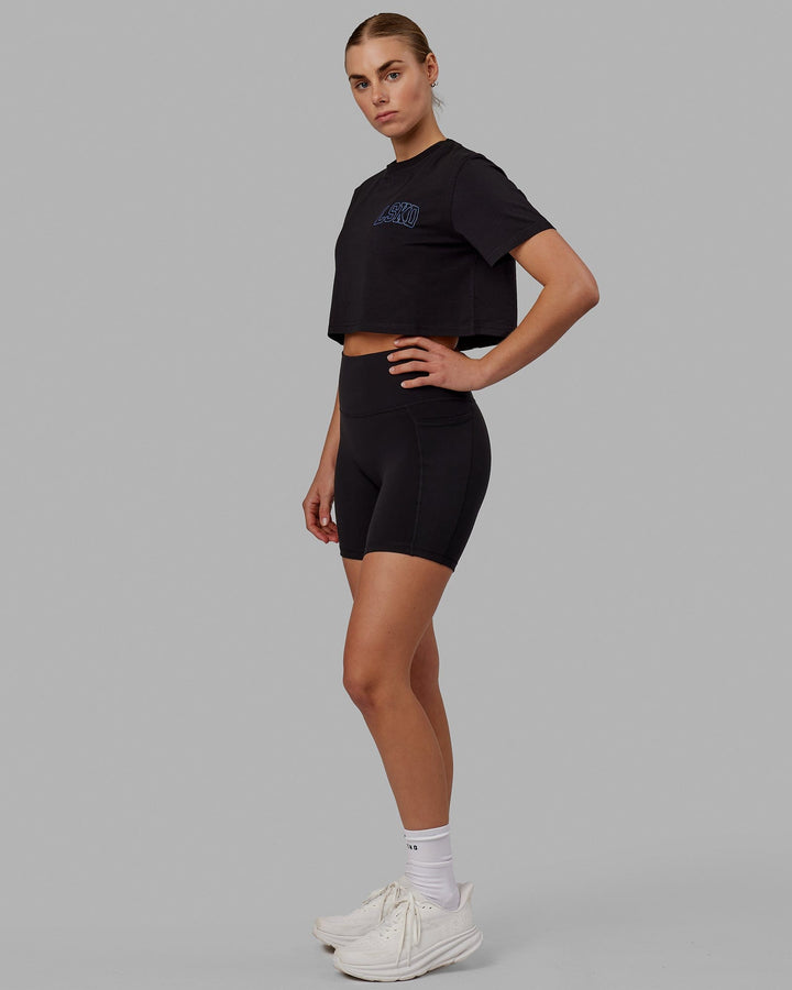Woman wearing Finish Line Cropped Tee - Black-Power Cobalt